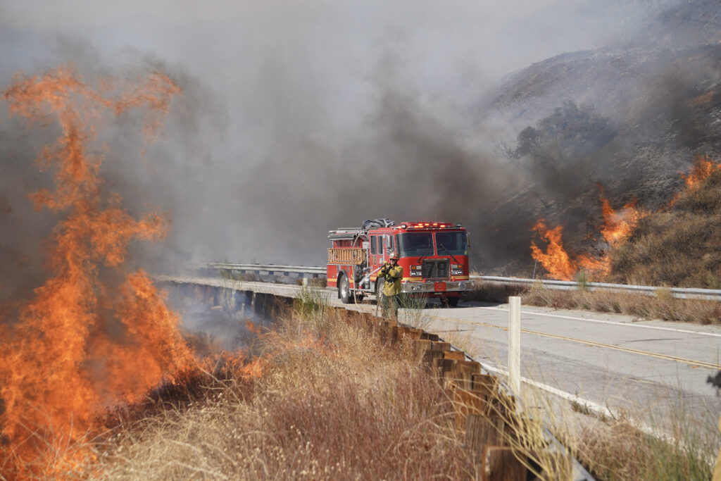 Fighting a hillside blaze during the 2025 Los Angeles-area wildfires.