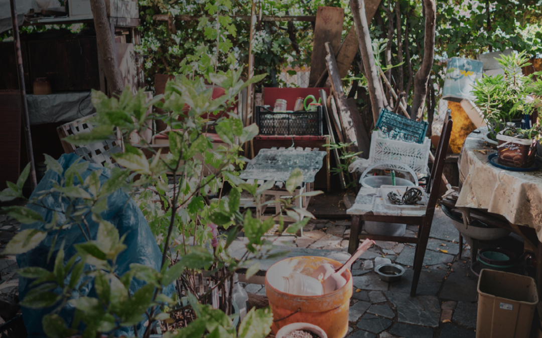 Protective Sweep of Junk-Filled Yard Leads to Search of House and Seized Weapon